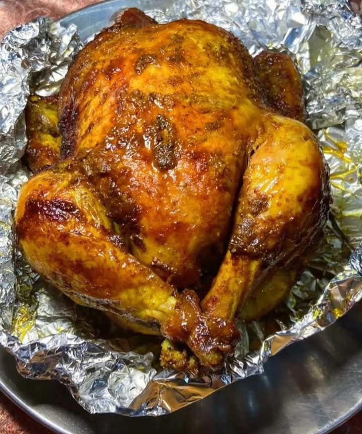 A simple, dependable roast chicken with deeply golden, crispy skin and juicy, aromatic meat. This recipe uses a bright, spice-forward rub (paprika and turmeric for color)